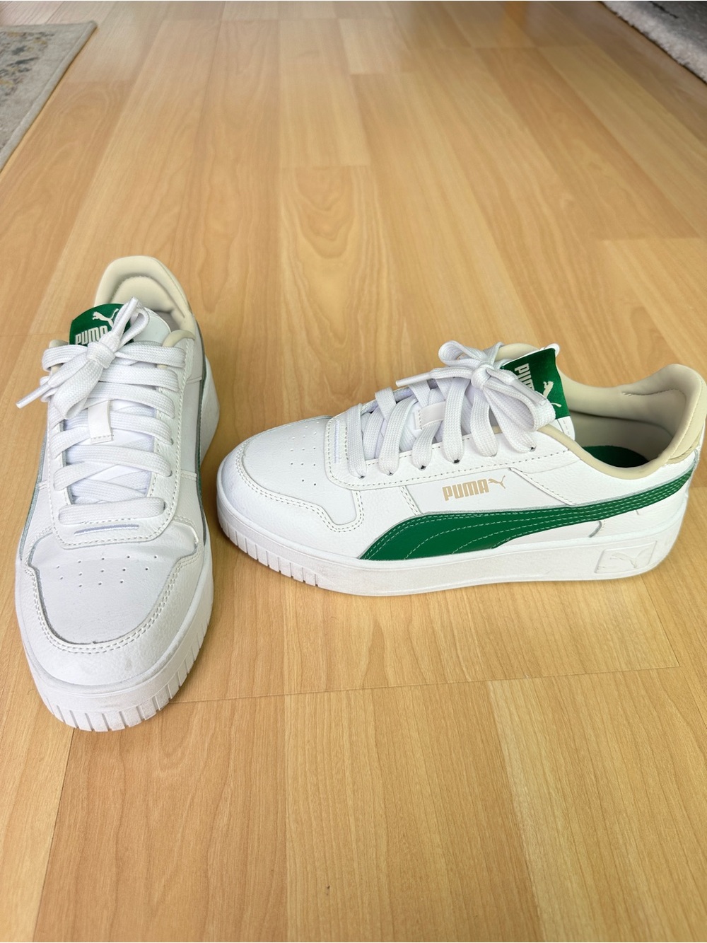 Puma White Sneakers with Green Stripe